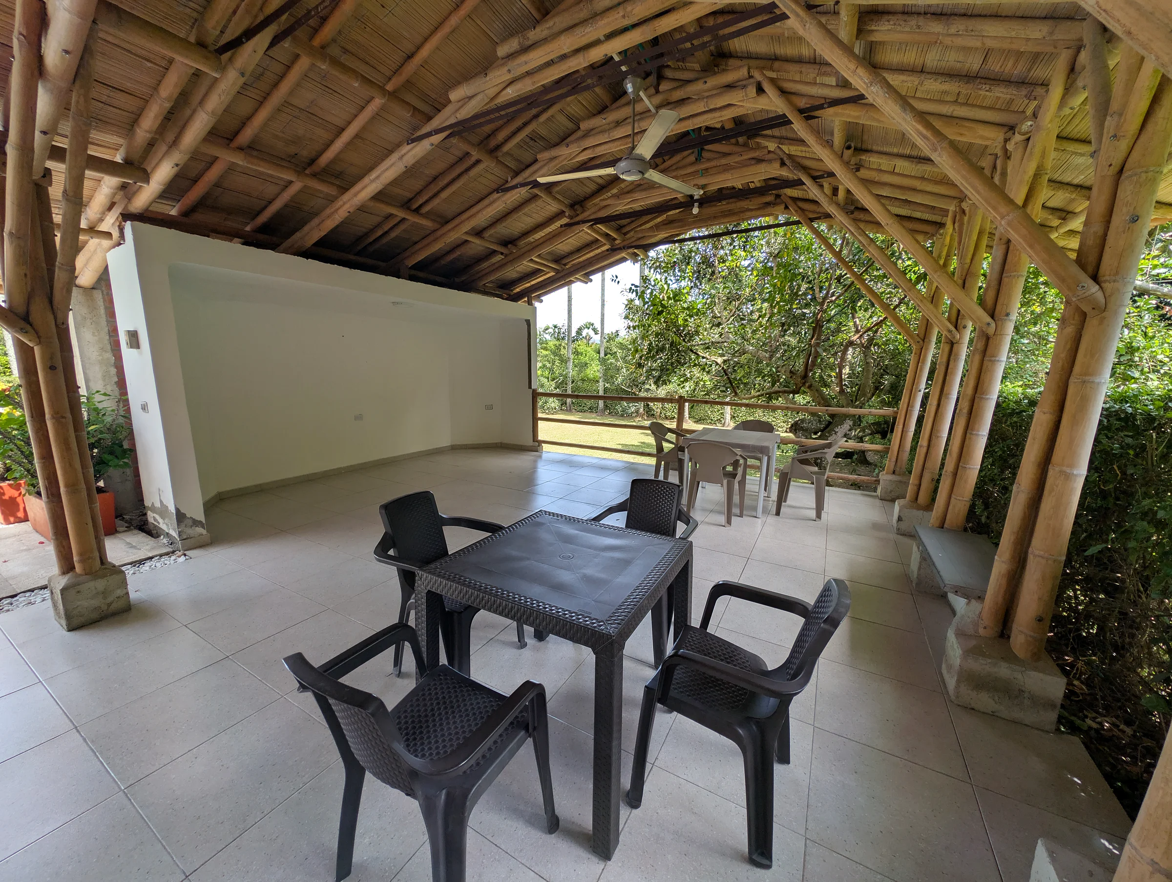 Bamboo pavilion among palm trees